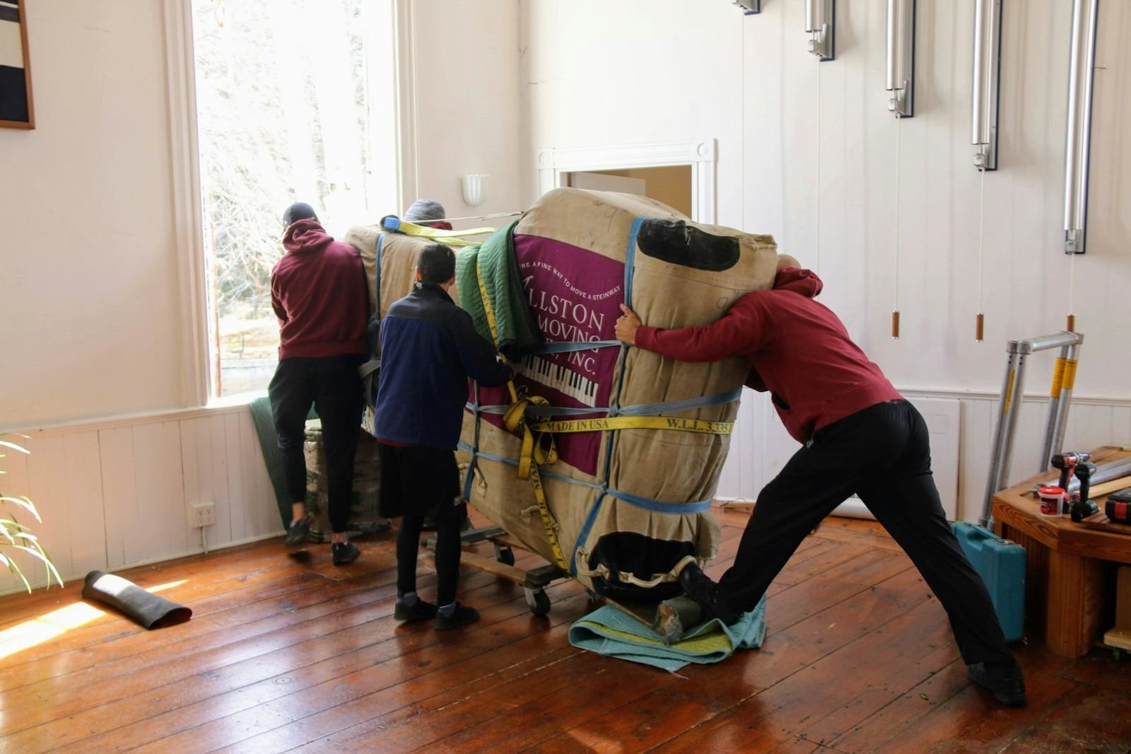 Crew handling protected materials on site